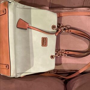 Like new purse used once mint green and tan made by simply Noelle